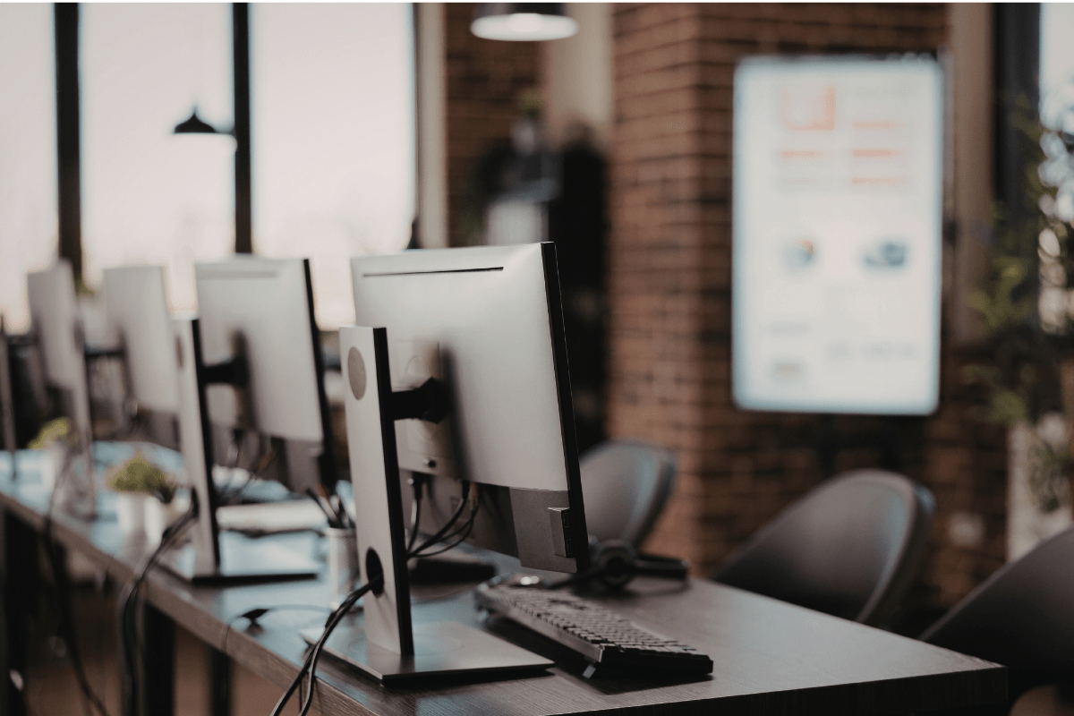 IT professional setting up business hardware equipment in a Calgary office environment representing PCe Solutions Hardware as a Service and IT procurement solutions for Calgary Alberta businesses